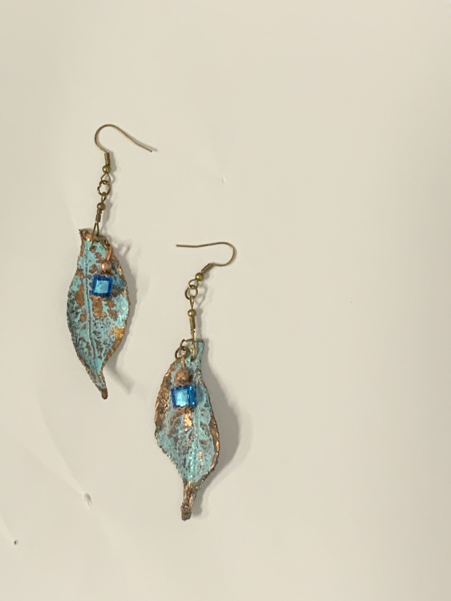 Earrings made of real leaves patinated in blue